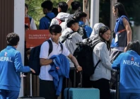 members of nepal s delegation arrive at the asian games in nagoya photo afp members of nepal s delegation arrive at the asian games in nagoya photo afp
