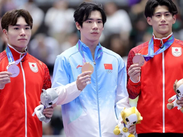 Zhang wins Asian Games gymnastics gold