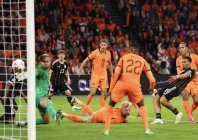 felix nmecha finds the back of the net from close range to give germany the lead photo afp