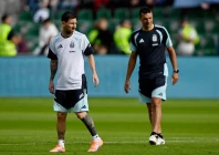argentina s lionel messi with coach lionel scaloni during training photo reuters