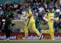 mitchell marsh and travis head run between wickets as australia defeat south africa by 45 runs dls method in the third one day international photo afp
