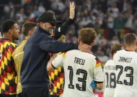 germany coach jurgen klopp centre celebrates with his players including defender philipp treu after the uefa nations league group a2 match between germany and serbia in munich photo afp