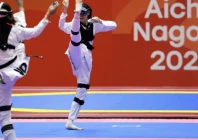 kazakhstan s rita bakisheva r competes against india s kashish malik in the mixed individual virtual taekwondo photo afp
