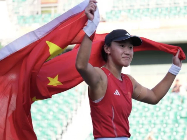 Wang wins Asian Games tennis gold and Olympic berth