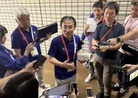 takaaki omi of the aichi nagoya asian games organizing committee ainagoc speaks to reporters on tuesday in nagoya photo afp