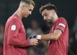 portugal playmaker bruno fernandes said cristiano ronaldo remains the country s greatest footballing icon despite walking out on the squad this week after finding out he would not start a match photo afp