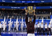 novak djokovic celebrating with the trophy after winning the china open on oct 6 following the retirement of australia s alex de minaur photo afp