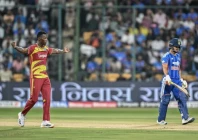 west indies shamar joseph left celebrates after taking the wicket of india s ishan kishan right during the fifth t20 international photo afp