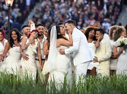 super bowl 2026 wedding couple marries live during bad bunny performance
