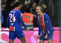mika godts r and senny mayulu l scored the goals as psg beat lyon 2 0 on monday to go top of ligue 1 photo afp