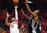 jalen brunson of the new york knicks shoots the ball over the san antonio spurs victor wembanyama in game one of the nba finals photo afp
