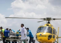 medics and rescuers transfer mountaineer dawasherpa from a helicopter upon his arrival at the hams hospital in kathmandu on june 4 photo afp
