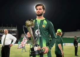 shaheen shah afridi holds the trophy after pakistan s odi series win photo afp