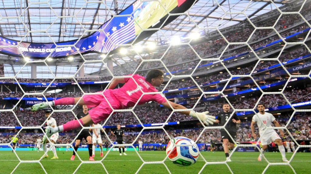 Iran fight back to draw with New Zealand as Spain are held by Cape Verde