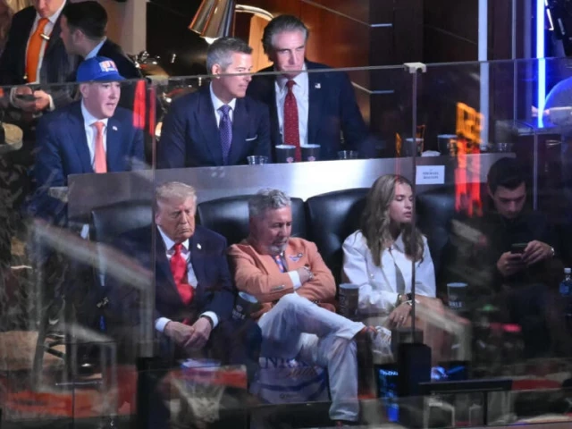us president donald trump sits next to knicks owner james dolan as they attend game three of the nba finals photo afp us president donald trump sits next to knicks owner james dolan as they attend game three of the nba finals photo afp