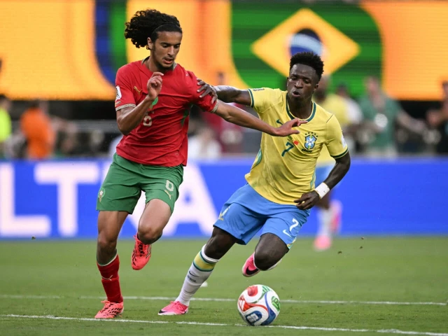 ayyoub bouaddi l looked at home in the morocco midfield on his world cup debut against five time champions brazil photo afp ayyoub bouaddi l looked at home in the morocco midfield on his world cup debut against five time champions brazil photo afp