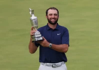 scottie scheffler of the u s celebrates with the claret jug trophy after winning the 153rd open championship photo reuters