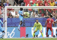 yoane wissa s goal secured the democratic republic of congo s first ever point at a world cup in a 1 1 draw with portugal photo afp