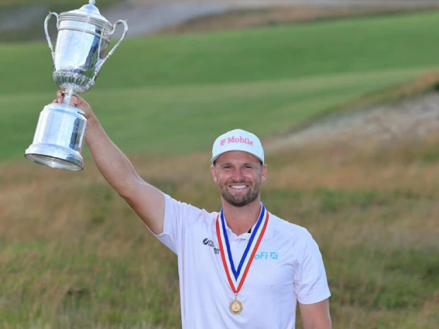 wyndham clark holds trophy aloft after winning the 126th us open at shinnecock for his second us open title in four years photo afp wyndham clark holds trophy aloft after winning the 126th us open at shinnecock for his second us open title in four years photo afp