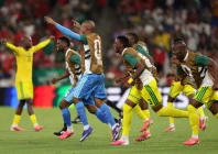 south african players celebrate their stunning victory over south korea photo afp