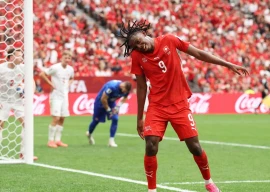 johan manzambi celebrates scoring the decisive second goal for switzerland against canada photo afp