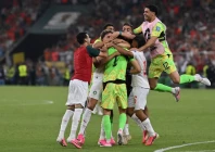 morocco players celebrate their victory over the netherlands after a penalty shootout photo afp