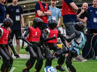 robot footballers thrill crowds in south korea