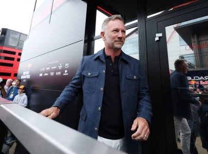 horner returns to f1 paddock a year after sacking