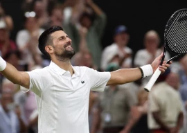 serbia s novak djokovic celebrates beating canada s felix auger aliassime at wimbledon photo afp