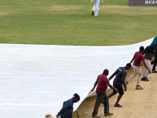 ground staff pull on the covers during the fifth and final day of the second test between sri lanka and west indies photo afp file ground staff pull on the covers during the fifth and final day of the second test between sri lanka and west indies photo afp file