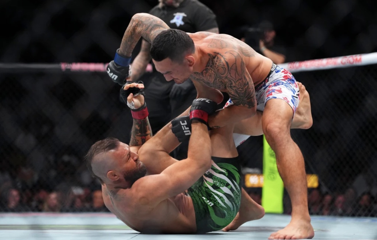 McGregor vows to return after knee injury in UFC comeback defeat