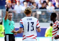 folarin balogun of the u s is shown a red card by referee raphael claus photo reuters