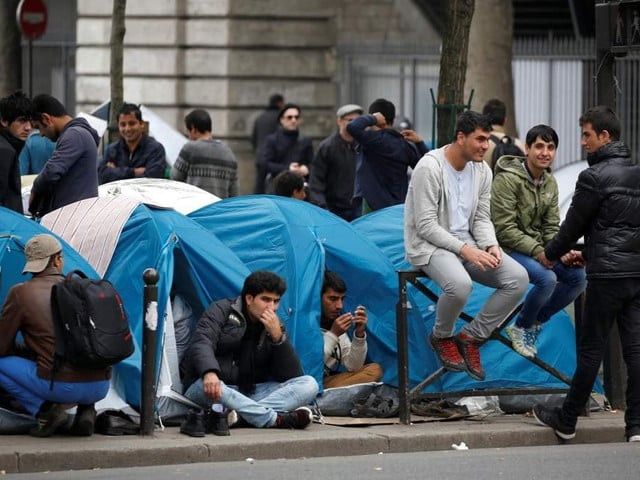 refugees and migrants sleep in makeshift tents across france as they wait to seek asylum photo reuters refugees and migrants sleep in makeshift tents across france as they wait to seek asylum photo reuters