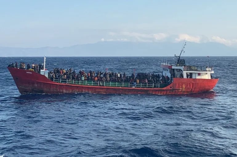 a cargo ship carries refugees and migrants during a rescue operation as it sails off the island of crete greece photo reuters