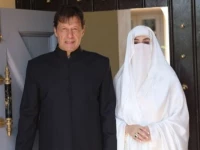 pti founder imran khan and his wife bushra bibi photo file