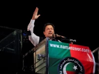 imran khan gestures as he addresses supporters during a rally in lahore on april 21 2022 photo reuters