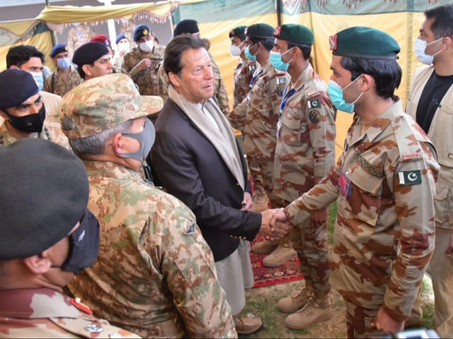 pm imran shaking hands with soldiers who participated in operation to repulse terrorists attack in panjgur and naushki photo express