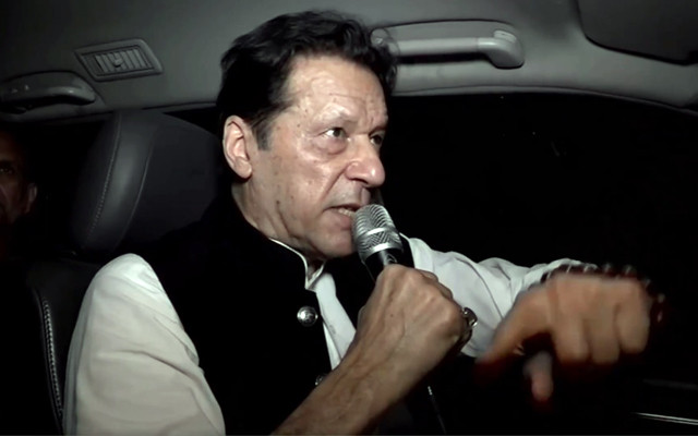 pti chief imran khan is addressing his supporters from inside his car in lahore on monday march 13 2023 screengrab