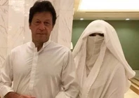 a combined photo of former prime minister imran khan l and his wife bushra imran photo file