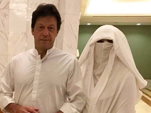 a combined photo of former prime minister imran khan l and his wife bushra imran photo file