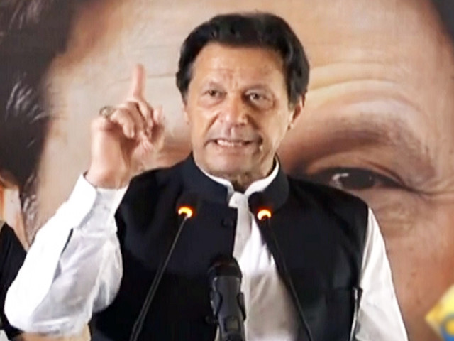 imran urges workers to go door to door for pti s azadi march