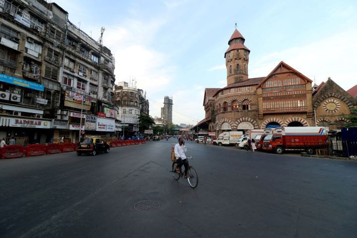 a man rides his bicycle during a lockdown to limit the spread of the coronavirus disease covid 19 in mumbai india april 23 2021 reuters niharika kulkarni file photo