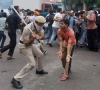 police use batons to disperse supporters of the cockroach janta party as they march toward parliament on the opening day of its monsoon session demanding the resignation of education minister dharmendra pradhan over exam paper leaks in new delhi india july 20 2026 photo reuters