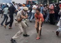 police use batons to disperse supporters of the cockroach janta party as they march toward parliament on the opening day of its monsoon session demanding the resignation of education minister dharmendra pradhan over exam paper leaks in new delhi india july 20 2026 photo reuters