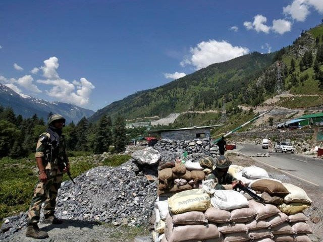 india s border security force bsf soldiers stand guard at a checkpoint along a highway leading to ladakh at gagangeer in kashmir s ganderbal district june 17 2020 photo reuters india s border security force bsf soldiers stand guard at a checkpoint along a highway leading to ladakh at gagangeer in kashmir s ganderbal district june 17 2020 photo reuters