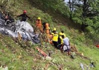 members of rescue teams work at the site of a chopper crash in the gaurikund area of the northern indian state of uttarakhand india june 15 2025 photo reuters