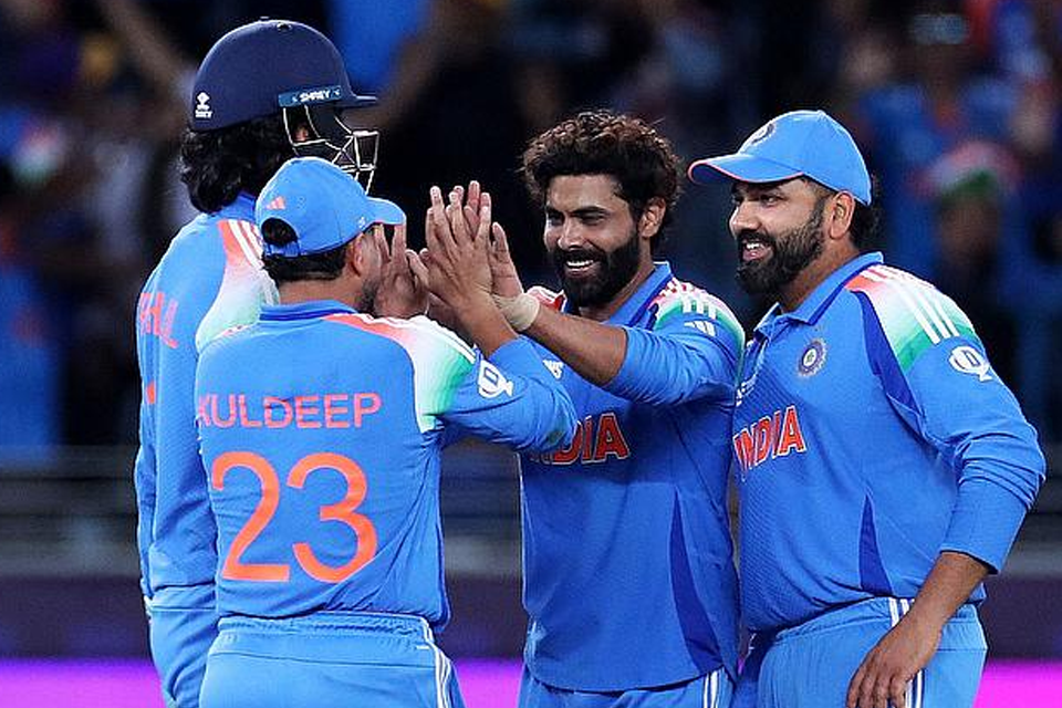 india s ravindra jadeja celebrates with teammates after taking the lbw wicket of new zealand s tom latham photo reuters