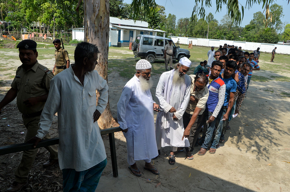 Indian citizens of Masaladanga enclave queue up to cast their vote at a polling station in Cooch Behar district on April 11, 2019, during the first phase of general election in the eastern Indian state of West Bengal. PHOTO: AFP