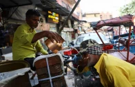 a cycle rickshaw puller drinks water distributed for free by mohammed hasin on a street on a hot summer day in old delhi india may 22 2026 photo reuters