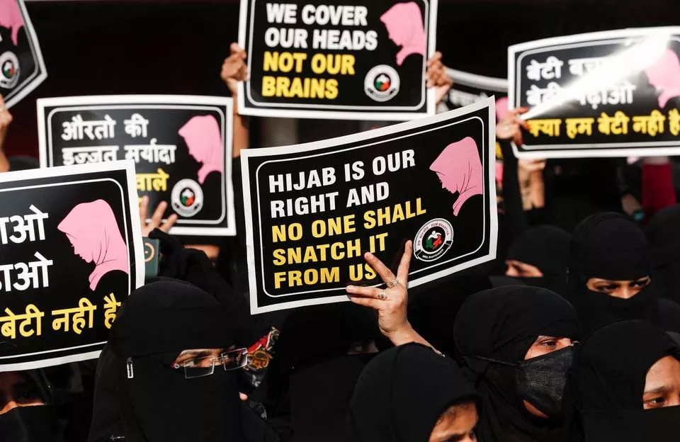 women hold placards during a protest organised by hum bhartiya against the recent hijab ban in few colleges of karnataka state on the outskirts of mumbai india february 11 2022 photo reuters women hold placards during a protest organised by hum bhartiya against the recent hijab ban in few colleges of karnataka state on the outskirts of mumbai india february 11 2022 photo reuters